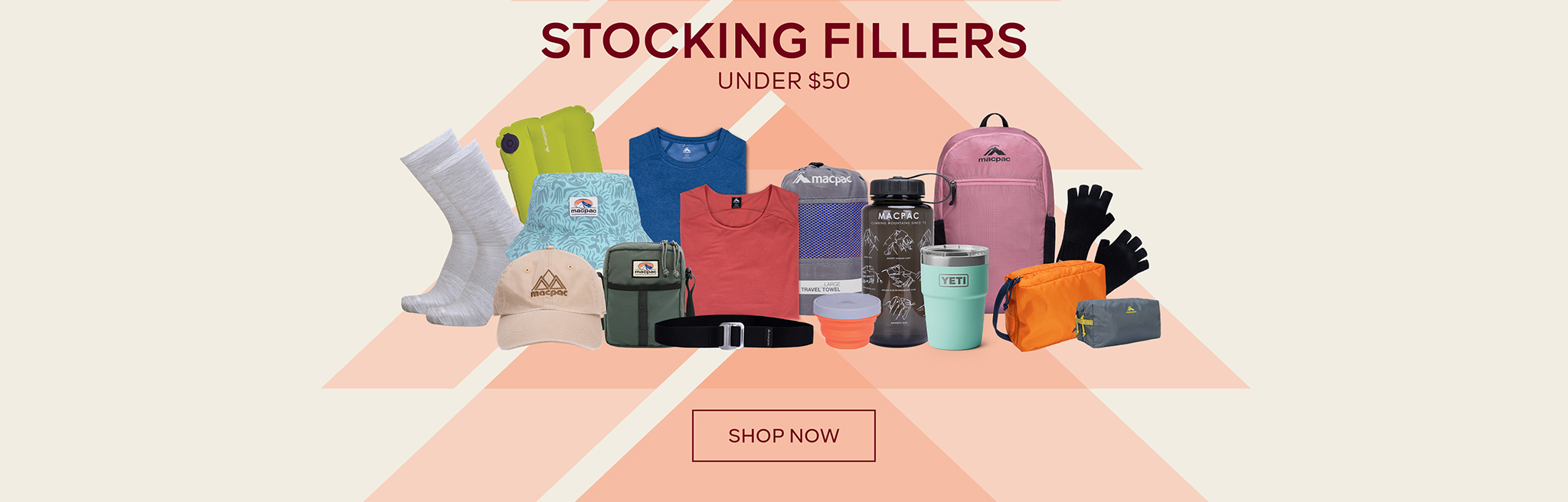 STOCKING FILLERS UNDER $50 - SHOP NOW - Assortment of small items, including socks caps and hats t-shirts and drinkware